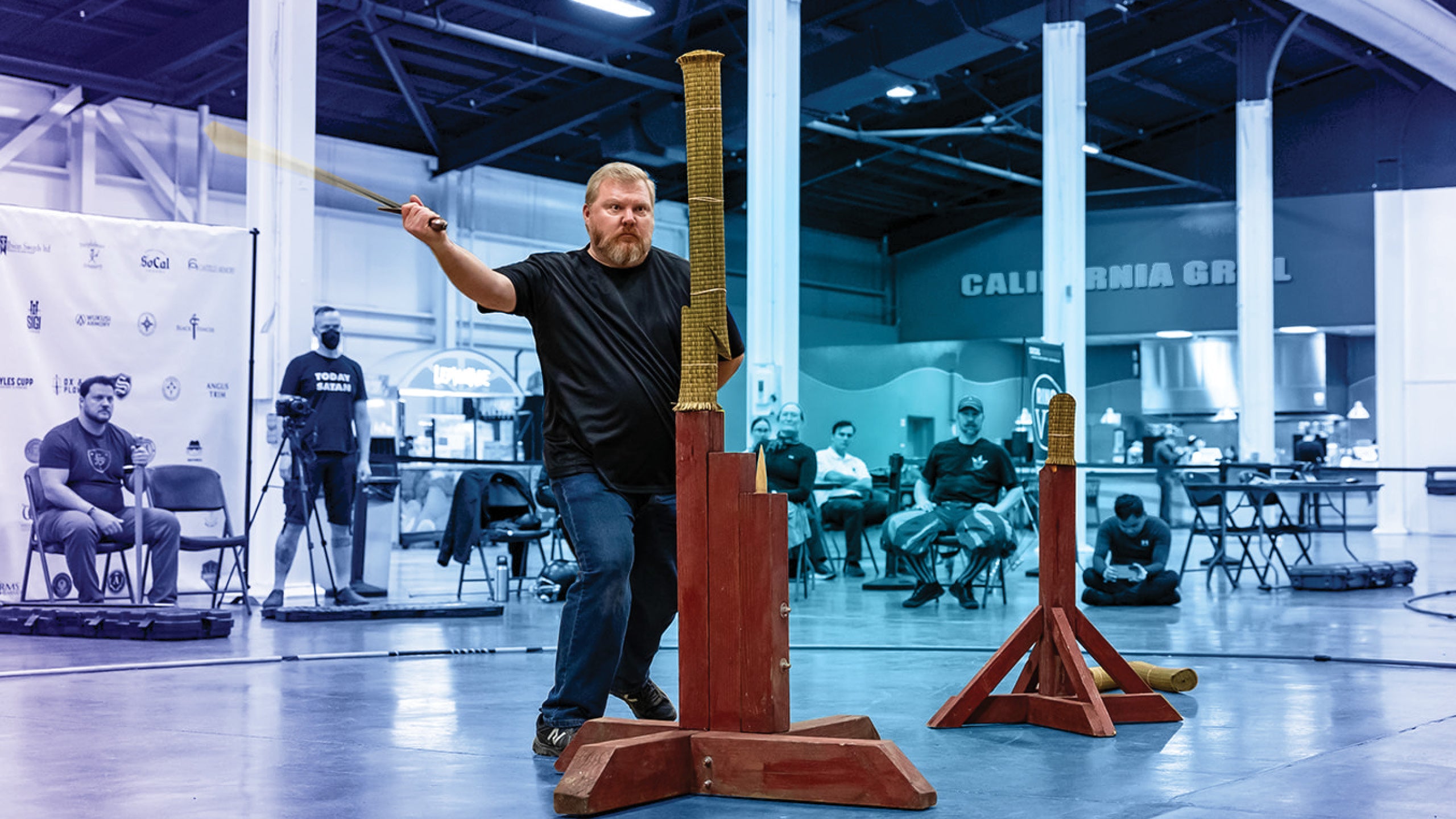 Phillip Martin executing the second double cut in the Tier A Arming Sword Cutting Finals at SoCal Swordfight.