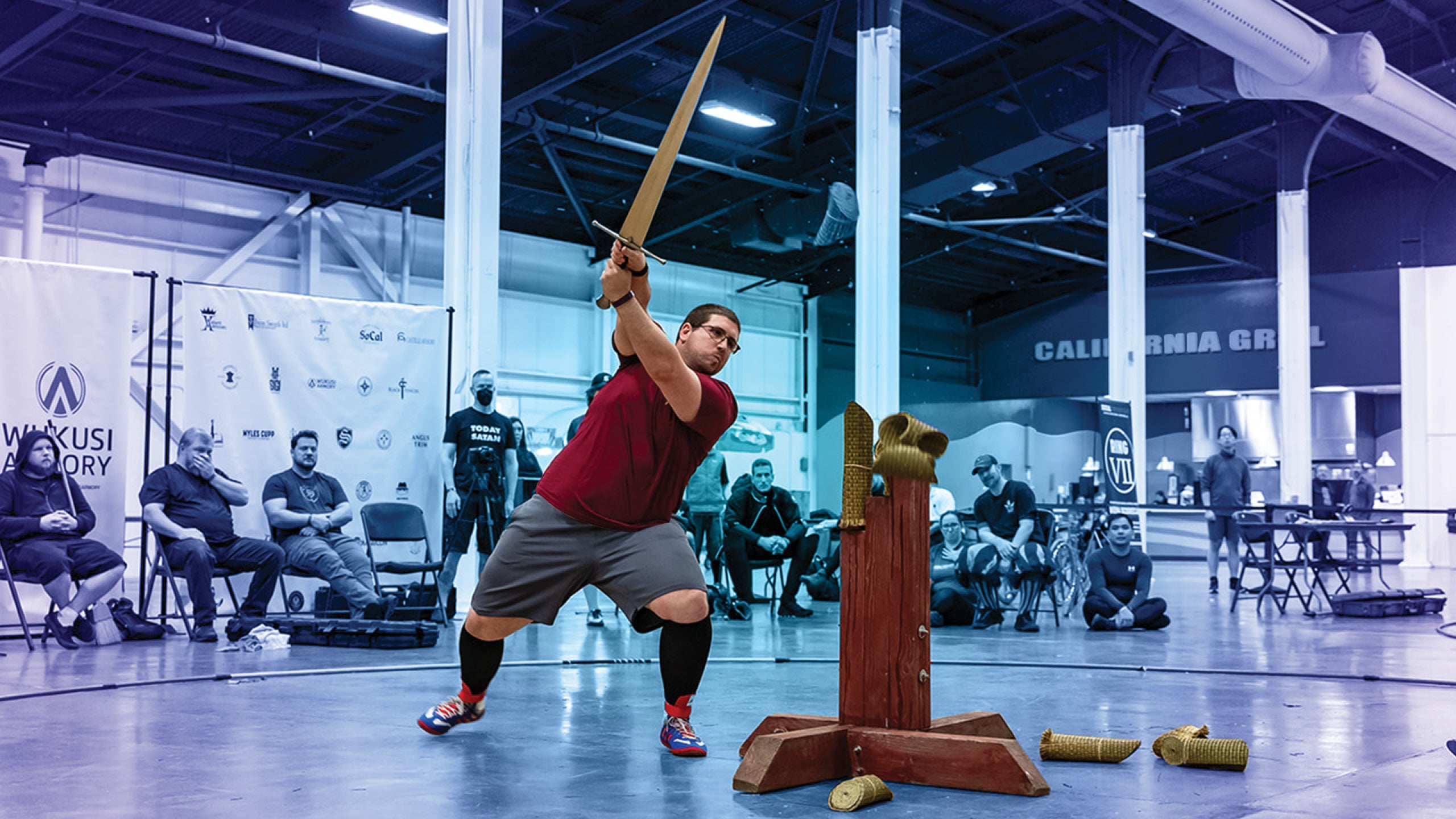 Nolan Duino of SoCal Swords executing a precise cut at the SoCal Swordfight 2024 Longsword Tournament.